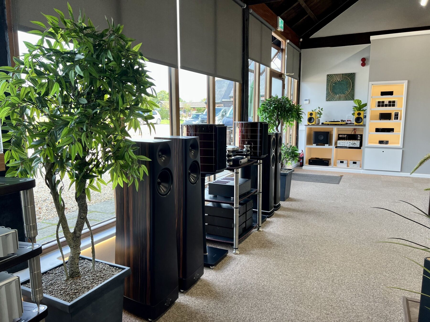 Loudspeakers and electronics on demonstration in the Jordan Acoustics showroom, beside a full height window